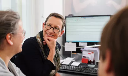 Arzt und Diabetesberater/Patient im Gespräch