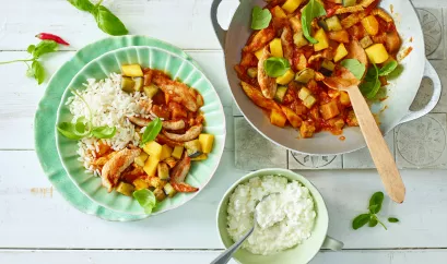 Putencurry mit Mango und Reis