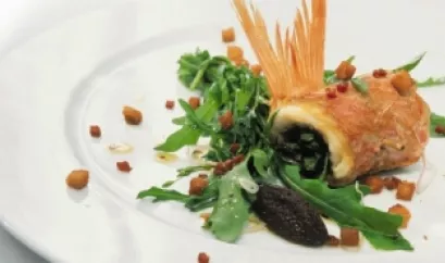 Fisch auf Salat